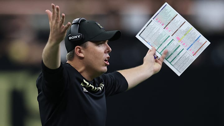 New Orleans Saints head coach Kellen Moore expresses his displeasure at a call in a game against the New York Giants on Oct. 12, 2025. 