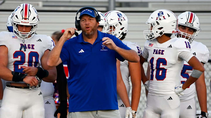 Page coach Charles Rathbone watches from the sidelines during a high school football game against Green Hill Friday, Aug. 29, 2025, in Mt. Juliet, Tenn. Page coach Charles Rathbone watches from the sidelines during a high school football game against Green Hill Friday, Aug. 29, 2025, in Mt. Juliet, Tenn.