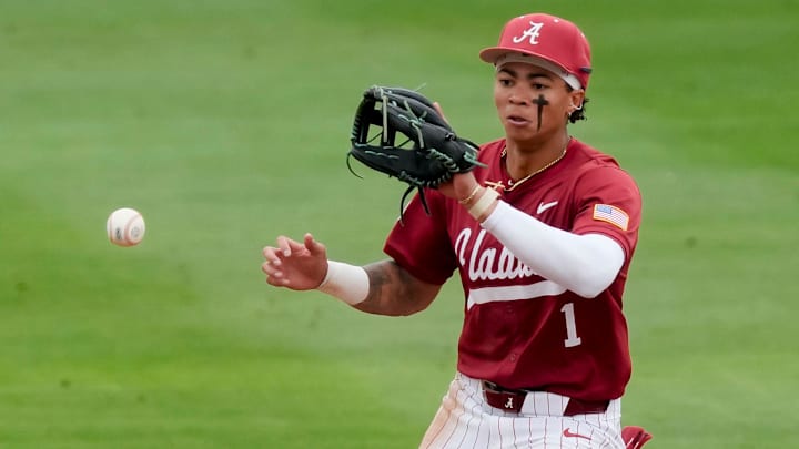 May 1, 2026; Tuscaloosa, AL, USA; Alabama shortstop Justin Lebron (1) makes the play on a bouncer to short as the Crimson Tide downed Vanderbilt in game 2 of the series 5-0 in Sewell-Thomas Stadium.
