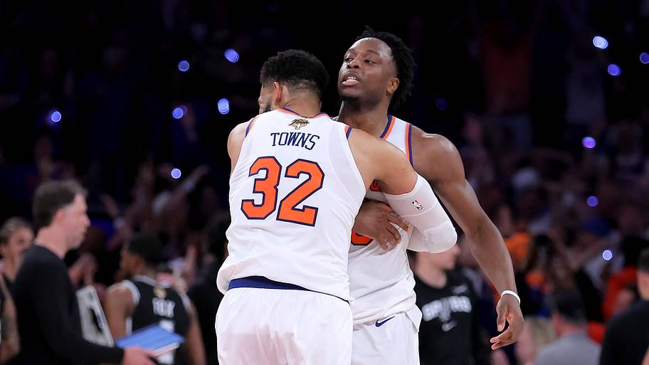 New York Knicks center Karl-Anthony Towns hugs forward OG Anunoby after Anunoby's go ahead basket vs. the Spurs.