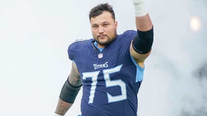 Tennessee Titans offensive tackle Dillon Radunz (75) enters the field before the Titans play the Bengals at Nissan Stadium in Nashville, Tenn., Sunday, Dec. 15, 2024.