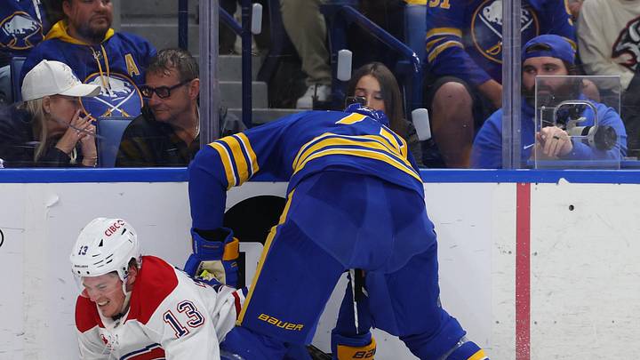 May 6, 2026; Buffalo, New York, USA; Buffalo Sabres center Tage Thompson (72) checks Montréal Canadiens right wing Cole Caufield (13) as he goes after a loose puck during the third period in game one of the second round of the 2026 Stanley Cup Playoffs at KeyBank Center. Mandatory Credit: Timothy T. Ludwig-Imagn Images