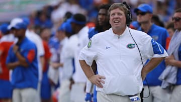 Sep 26, 2015; Gainesville, FL, USA; Florida Gators head coach Jim McElwain looks up against the Tennessee Volunteers during the first half at Ben Hill Griffin Stadium. Mandatory Credit: Kim Klement-Imagn Images