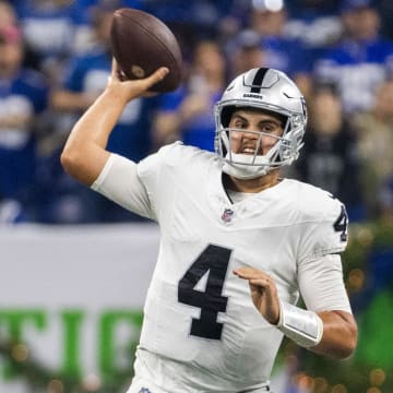 Dec 31, 2023; Indianapolis, Indiana, USA; Las Vegas Raiders quarterback Aidan O'Connell (4) passes the ball  in the first half against the Indianapolis Colts at Lucas Oil Stadium. Mandatory Credit: Trevor Ruszkowski-USA TODAY Sports