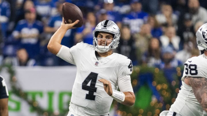 Dec 31, 2023; Indianapolis, Indiana, USA; Las Vegas Raiders quarterback Aidan O'Connell (4) passes the ball  in the first half against the Indianapolis Colts at Lucas Oil Stadium. Mandatory Credit: Trevor Ruszkowski-USA TODAY Sports