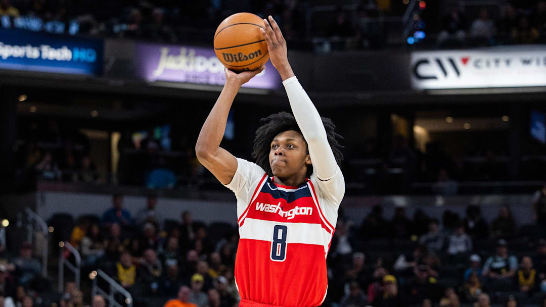 Apr 8, 2025; Indianapolis, Indiana, USA; Washington Wizards guard Bub Carrington (8) shoots the ball in the second half against the Indiana Pacers at Gainbridge Fieldhouse. Mandatory Credit: Trevor Ruszkowski-Imagn Images