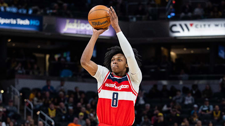 Apr 8, 2025; Indianapolis, Indiana, USA; Washington Wizards guard Bub Carrington (8) shoots the ball in the second half against the Indiana Pacers at Gainbridge Fieldhouse. Mandatory Credit: Trevor Ruszkowski-Imagn Images