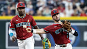 Sep 7, 2025; Phoenix, Arizona, USA; Arizona Diamondbacks infielders Blaze Alexander (right) and Geraldo Perdomo against the Boston Red Sox at Chase Field. Mandatory Credit: Mark J. Rebilas-Imagn Images