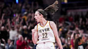 Indiana Fever guard Caitlin Clark (22) celebrates during a game between the Indiana Fever and the New York Liberty at Gainbridge Fieldhouse.