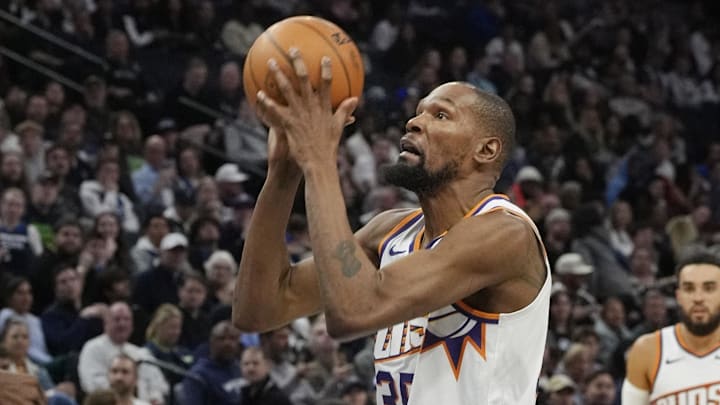 Mar 28, 2025; Minneapolis, Minnesota, USA; Phoenix Suns forward Kevin Durant (35) shoots against the Minnesota Timberwolves in the third quarter at Target Center. Mandatory Credit: Bruce Kluckhohn-Imagn Images