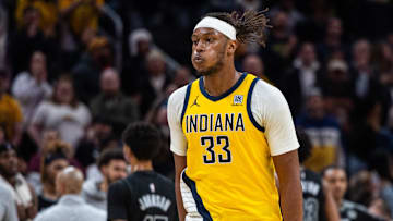 Mar 20, 2025; Indianapolis, Indiana, USA; Indiana Pacers center Myles Turner (33) celebrates the game winning block in the game against the Brooklyn Nets at Gainbridge Fieldhouse. Mandatory Credit: Trevor Ruszkowski-Imagn Images