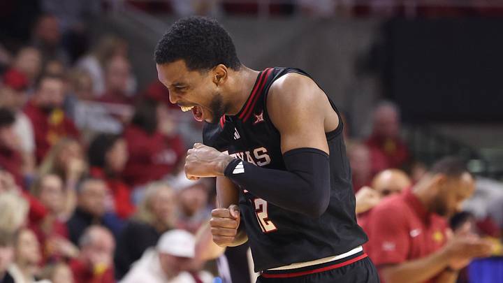 Feb 28, 2026; Ames, Iowa, USA; Texas Tech Red Raiders forward Donovan Atwell (12) celebrates in their game with the Iowa State Cyclones during the first half at James H. Hilton Coliseum. Mandatory Credit: Reese Strickland-Imagn Images