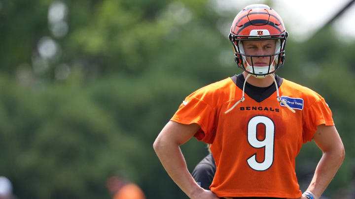 Jul 26, 2024; Cincinnati, OH, USA; Cincinnati Bengals quarterback Joe Burrow (9), who did not throw, observes practice during training camp practice at Kettering Health Practice Fields. Mandatory Credit: Kareem Elgazzar-USA TODAY Sports