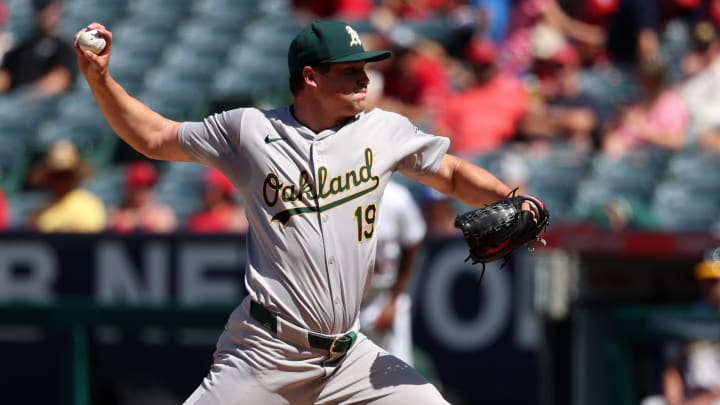 Jun 26, 2024; Anaheim, California, USA;  Oakland Athletics relief pitcher Mason Miller (19) pitches during the eighth inning against the Los Angeles Angels at Angel Stadium. Mandatory Credit: Kiyoshi Mio-USA TODAY Sports