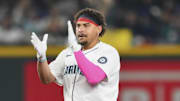 Oct 10, 2025; Seattle, Washington, USA; Seattle Mariners first baseman Josh Naylor (12) reacts after a double against the Detroit Tigers during the second inning during game five of the ALDS round for the 2025 MLB playoffs at T-Mobile Park. Mandatory Credit: Steven Bisig-Imagn Images
