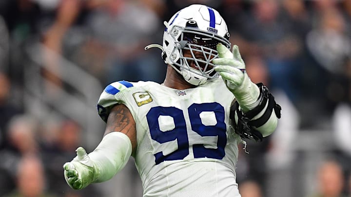 Nov 13, 2022; Paradise, Nevada, USA; Indianapolis Colts defensive tackle DeForest Buckner (99) reacts after sacking Las Vegas Raiders quarterback Derek Carr (4) during the second half at Allegiant Stadium. 