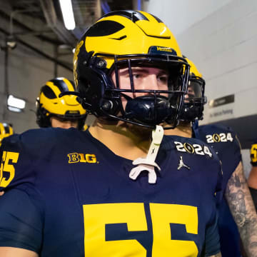 Jan 8, 2024; Houston, TX, USA; Michigan Wolverines defensive lineman Mason Graham (55) against the Washington Huskies during the 2024 College Football Playoff national championship game at NRG Stadium. Mandatory Credit: Mark J. Rebilas-USA TODAY Sports