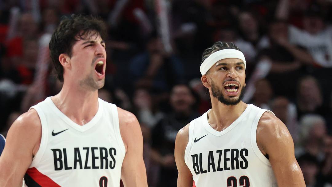 Apr 10, 2026; Portland, Oregon, USA;  Portland Trail Blazers forward Deni Avdija (8) and forward Toumani Camara (33) react after a play against the LA Clippers during the second half at Moda Center. Mandatory Credit: Jaime Valdez-Imagn Images