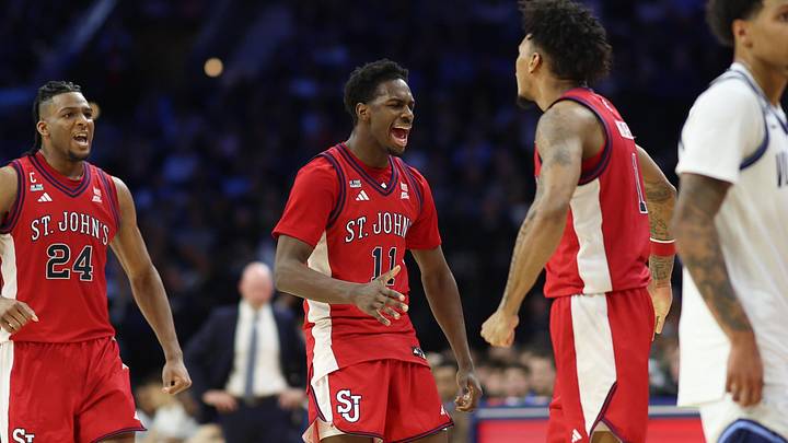 Jan 17, 2026; Philadelphia, Pennsylvania, USA; St. John's basketball guard Ian Jackson (11) reacts to a score against the Villanova Wildcats during the second half at Xfinity Mobile Arena.