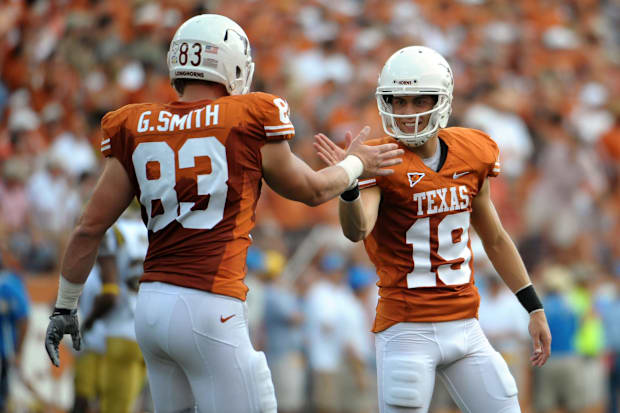 Justin Tucker, right, and Longhorns snapper Greg Smith react after scoring a field goal in 2010.