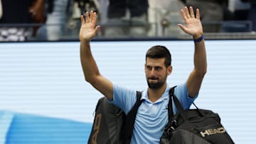 Novak Djokovic waves to the crowd