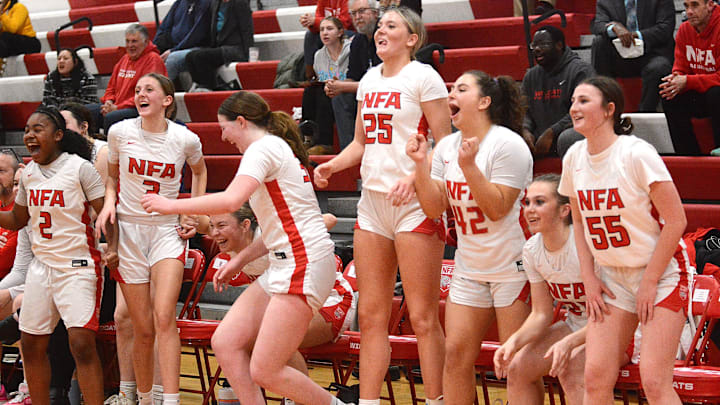 NFA players celebrate as they beat Manchester 61-32 Monday in a first round CIAC game in Norwich.
