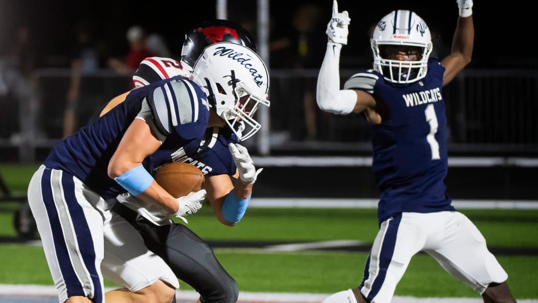 Dallastown's Michael Scott (1) reacts as Jack Mahoney (7) catches a pass in the end zone for a 25-yard touchdown during a YAIAA Division I football game against South Western Sept. 15, 2023, in Dallastown. The Wildcats won, 24-20.