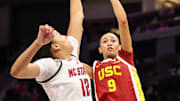 Nov 9, 2025; Charlotte, North Carolina, USA; Southern California Trojans guard Jazzy Davidson (9) shoots a basket against the NC State Wolfpack during the third quarter of the Ally Tipoff game at Spectrum Center. Mandatory Credit: Cory Knowlton-Imagn Images