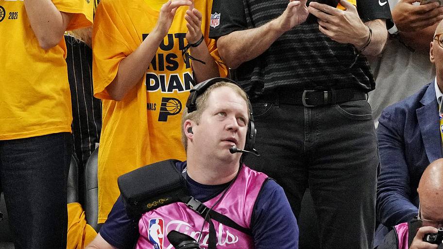 Indiana Fever player Caitlin Clark celebrates from the crowd during the 2025 NBA Finals between the Pacers and Oklahoma City 