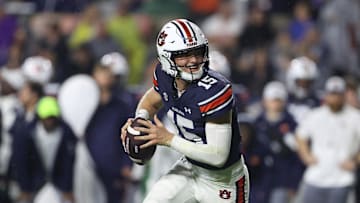 Sep 14, 2024; Auburn, Alabama, USA; Auburn Tigers quarterback Hank Brown (15) looks for a receiver during the third quarter against the New Mexico Lobos at Jordan-Hare Stadium. Mandatory Credit: John Reed-Imagn Images