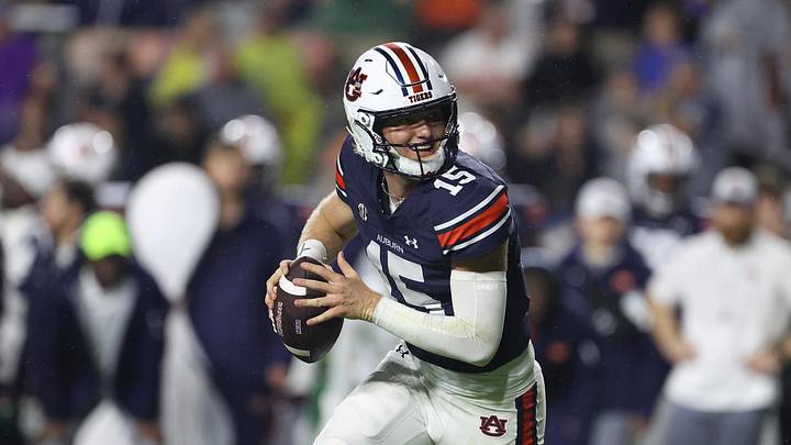 Sep 14, 2024; Auburn, Alabama, USA; Auburn Tigers quarterback Hank Brown (15) looks for a receiver during the third quarter against the New Mexico Lobos at Jordan-Hare Stadium. Mandatory Credit: John Reed-Imagn Images