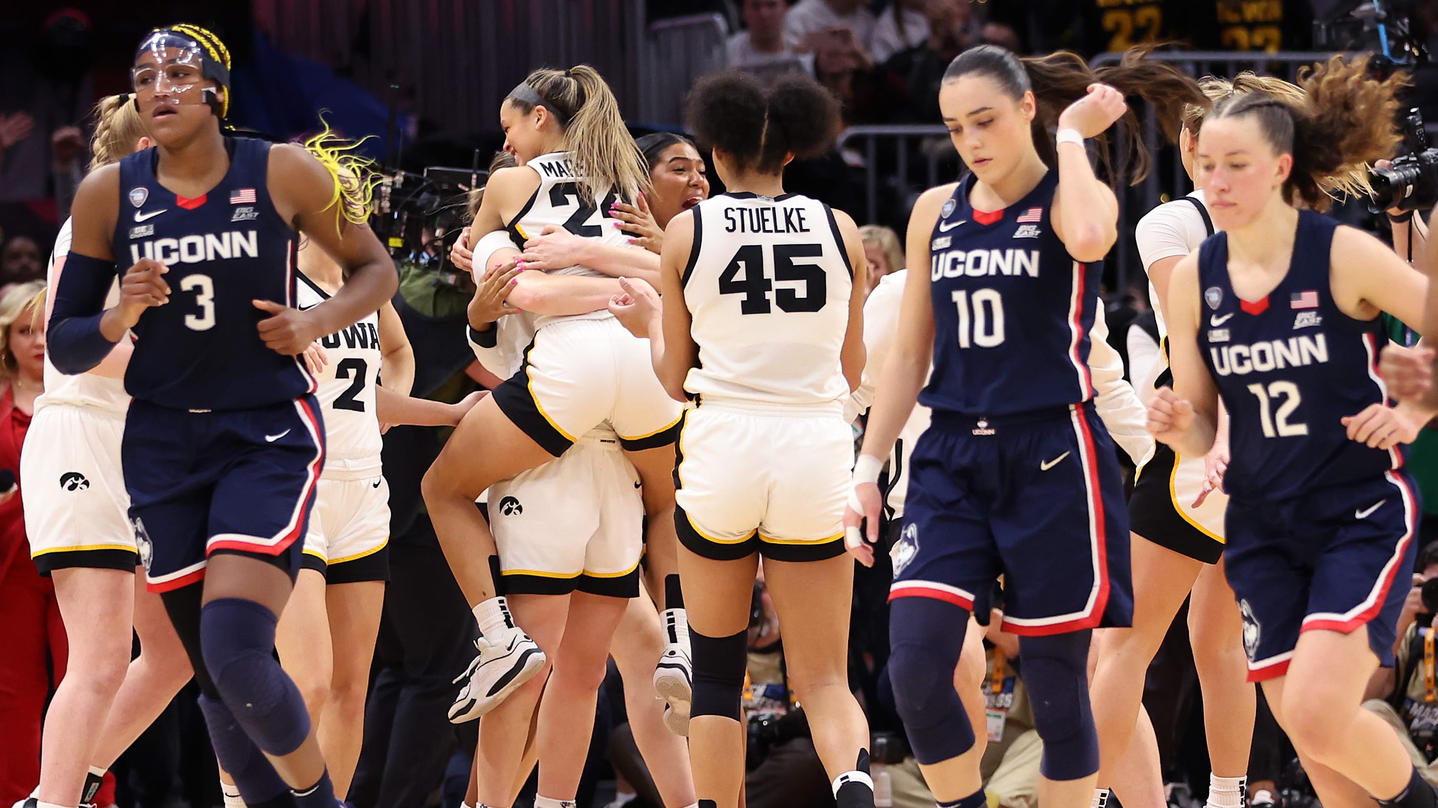 Iowa celebrates a win over UConn.