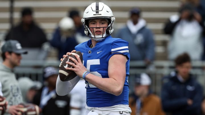 Penn State quarterback Drew Allar drops back to throw a pass during a warmup before the Blue-White Game at Beaver Stadium.