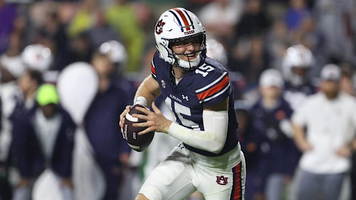 Sep 14, 2024; Auburn, Alabama, USA; Auburn Tigers quarterback Hank Brown (15) looks for a receiver during the third quarter against the New Mexico Lobos at Jordan-Hare Stadium. Mandatory Credit: John Reed-Imagn Images