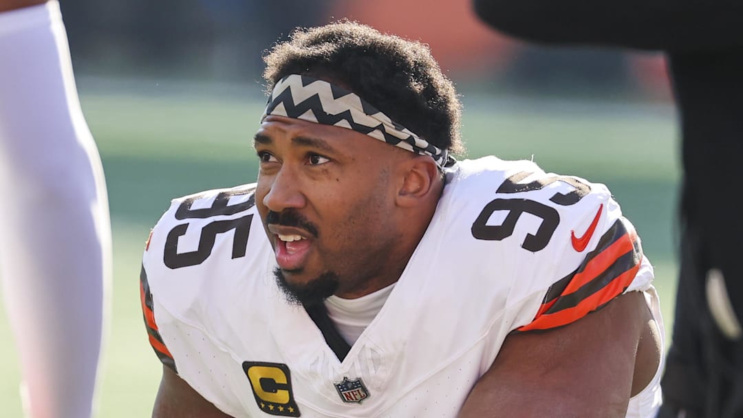 Jan 4, 2026; Cincinnati, Ohio, USA; Cleveland Browns defensive end Myles Garrett (95) kneels on the field during a first half timeout against the Cincinnati Bengals at Paycor Stadium.