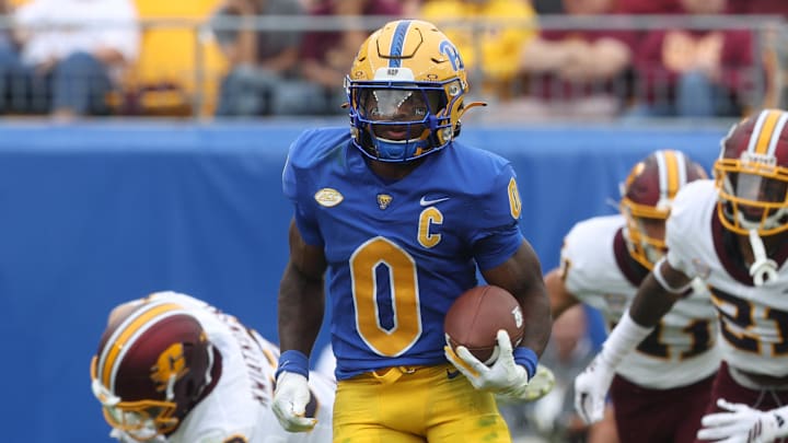 Sep 6, 2025; Pittsburgh, Pennsylvania, USA; Pittsburgh Panthers running back Desmond Reid (0) returns a punt against the Central Michigan Chippewas during the second quarter at Acrisure Stadium. Mandatory Credit: Charles LeClaire-Imagn Images Sep 6, 2025; Pittsburgh, Pennsylvania, USA; Pittsburgh Panthers running back Desmond Reid (0) returns a punt against the Central Michigan Chippewas during the second quarter at Acrisure Stadium. Mandatory Credit: Charles LeClaire-Imagn Images