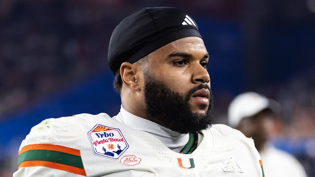 Jan 8, 2026; Glendale, AZ, USA; Miami Hurricanes defensive lineman Akheem Mesidor (3) against the Mississippi Rebels during the 2026 Fiesta Bowl and semifinal game of the College Football Playoff at State Farm Stadium. Mandatory Credit: Mark J. Rebilas-Imagn Images