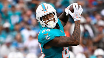Miami Dolphins tight end Darren Waller (83) catches the ball in the first quarter at Bank of America Stadium. 