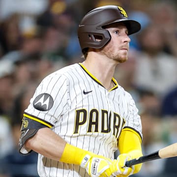 Sep 23, 2025; San Diego, California, USA; San Diego Padres first baseman Ryan O'Hearn (32) hits a grand slam during the first inning against the Milwaukee Brewers at Petco Park. Mandatory Credit: David Frerker-Imagn Images