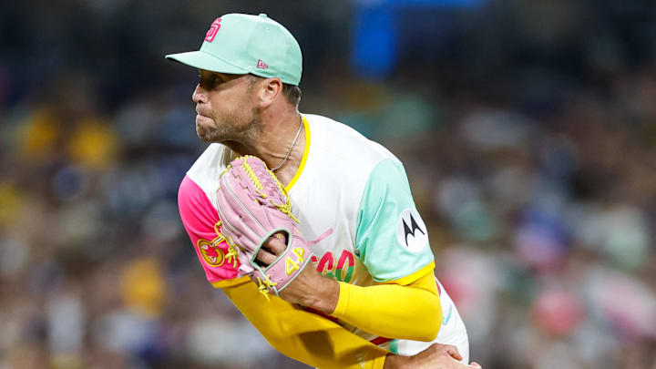 Jason Adam (40) throws a pitch during the seventh inning against the Los Angeles Dodgers at Petco Park. 