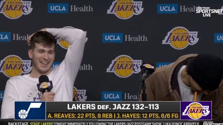 Austin Reaves reacts to a reporter using the word “aficionado” in a press conference. Austin Reaves reacts to a reporter using the word “aficionado” in a press conference.