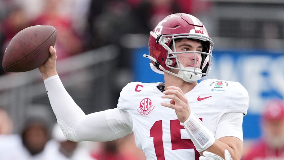 Ty Simpson winds up to throw a pass for Alabama.