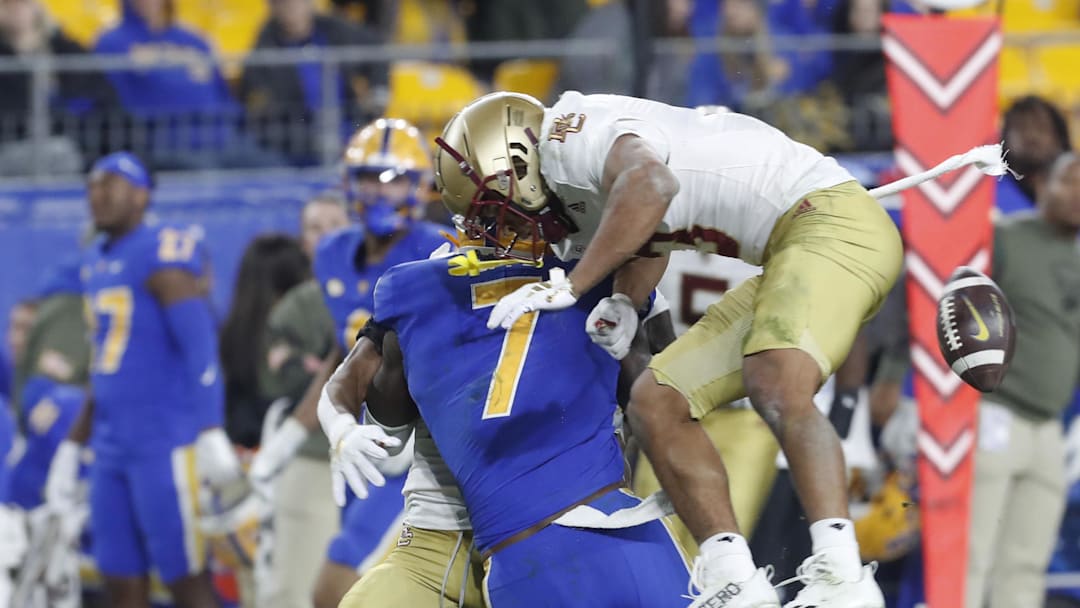 Nov 16, 2023; Pittsburgh, Pennsylvania, USA; Boston College Eagles defensive back Khari Johnson (3) commits a targeting penalty against Pittsburgh Panthers tight end Malcolm Epps (7) during the second quarter at Acrisure Stadium. Mandatory Credit: Charles LeClaire-Imagn Images