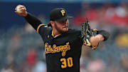 Pittsburgh Pirates starting pitcher Paul Skenes throws a pitch.