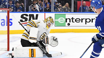 May 2, 2024; Toronto, Ontario, CAN;  Boston Bruins goalie Jeremy Swayman (1) makes a save on a shot from Toronto Maple Leafs forward Max Domi (11) in the third period in game six of the first round of the 2024 Stanley Cup Playoffs at Scotiabank Arena. Mandatory Credit: Dan Hamilton-Imagn Images