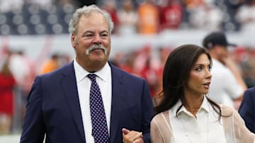 Sep 15, 2025; Houston, Texas, USA; Houston Texans principal owner Cal McNair and his wife Hannah Hartland walk on the field before the game against the Tampa Bay Buccaneers at NRG Stadium. Mandatory Credit: Thomas Shea-Imagn Images