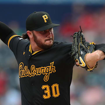 Pittsburgh Pirates starting pitcher Paul Skenes throws a pitch.