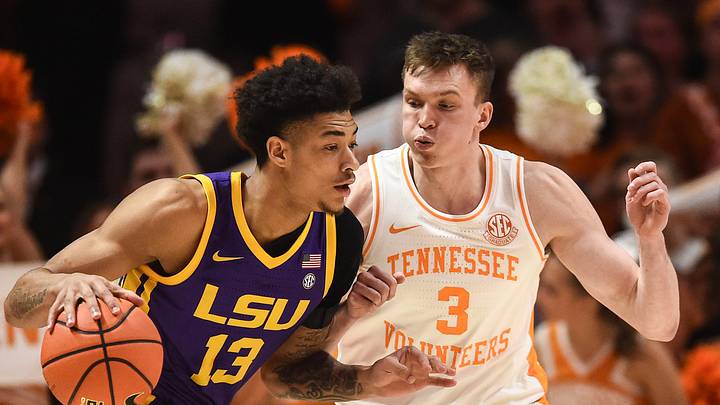 LSU's Jalen Reed (13) is guarded by Tennessee's Dalton Knecht (3) during an NCAA college basketball game on Wednesday, February 7, 2024 in Knoxville, Tenn.