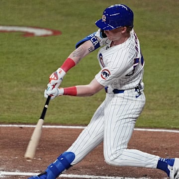 Jul 15, 2025; Cumberland, Georgia, USA; National League outfielder Pete Crow-Armstrong (4) of the Chicago Cubs hits a double during the second inning during the 2025 MLB All Star Game at Truist Park. 