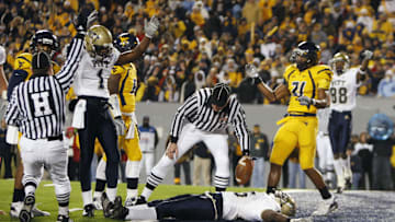 Dec 1, 2007, Morgantown, WV, USA; Pittsburgh Panthers running back (25) LeSean McCoy runs the ball close to the goal line but does not get the touchdown in the West Virginia Mountaineers 13-9 loss to the Pittsburgh Panthers at Mylan Puskar Stadium. Duhart recovered the fumble. Mandatory Credit: Bob Donnan-Imagn Images